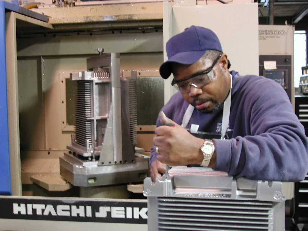 Working at a CNC machine