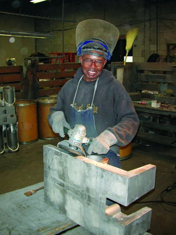 Grinding a metal casting